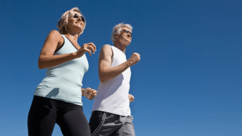 man and woman walking for exercise