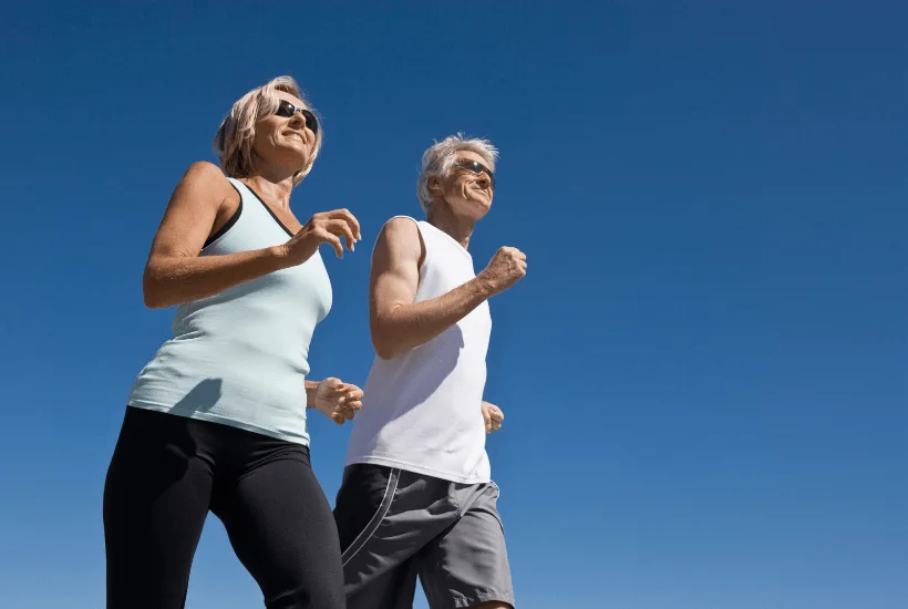 man and woman walking for exercise