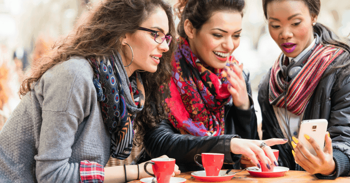 ladies sitting at a table chatting about counting macros for weight loss