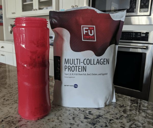 bag of collagen protein beside protein shake