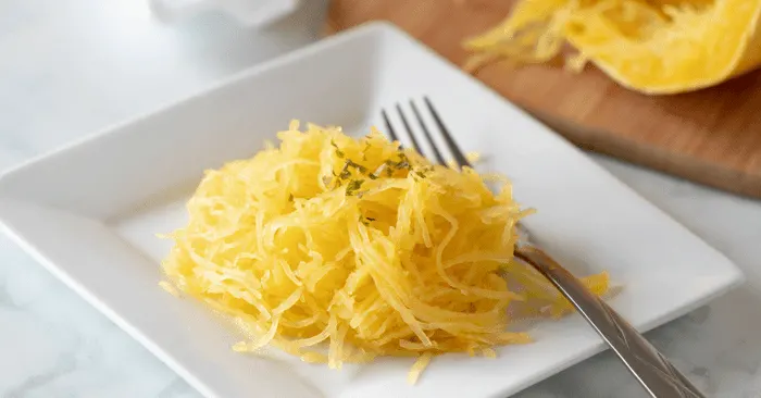 plate of baked spaghetti squash on plate with fork
