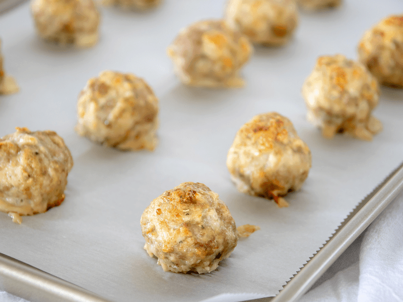 turkey meatballs on cookie sheet after baking in oven 20 min