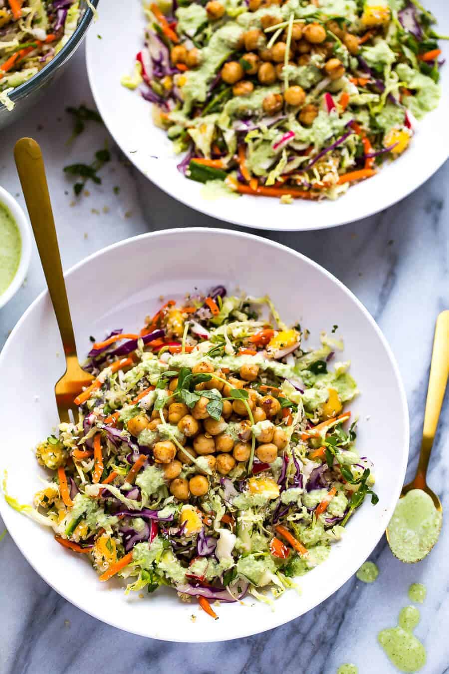 salad in a bowl with chickpea, quinoa and power greens