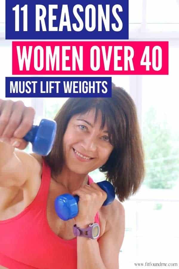 woman with hand weights looking at camera smiling