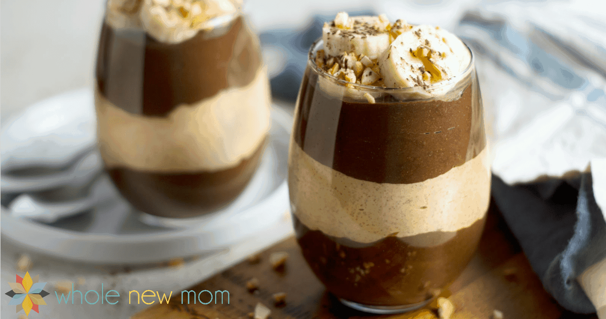 chocolate layered peanut butter chia pudding in 2 glass jars