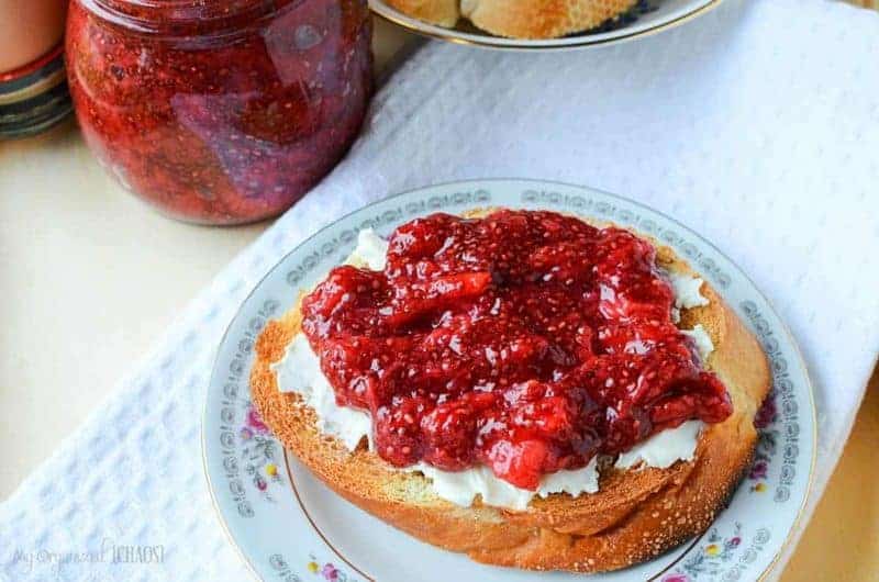 strawberry chia seed jam on bread on a bread plate