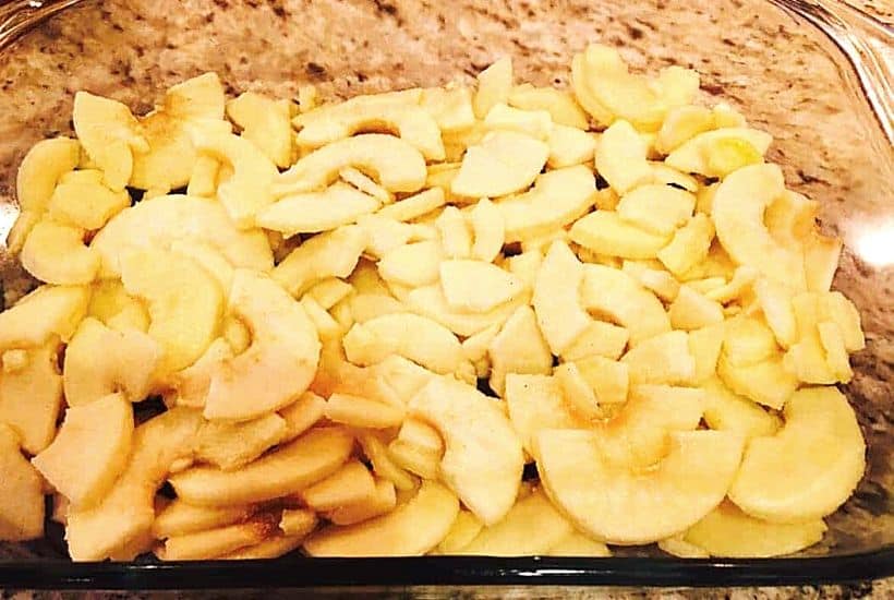 sliced and prepared apples in pan