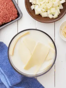 bowl of milk with hearts of palm pasta soaking