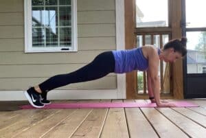 woman doing wide plank