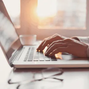 lady typing on laptop