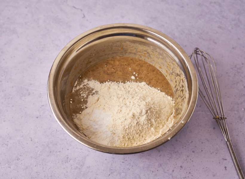 Wet ingredients and flour, salt, baking powder and baking soda added in bowl