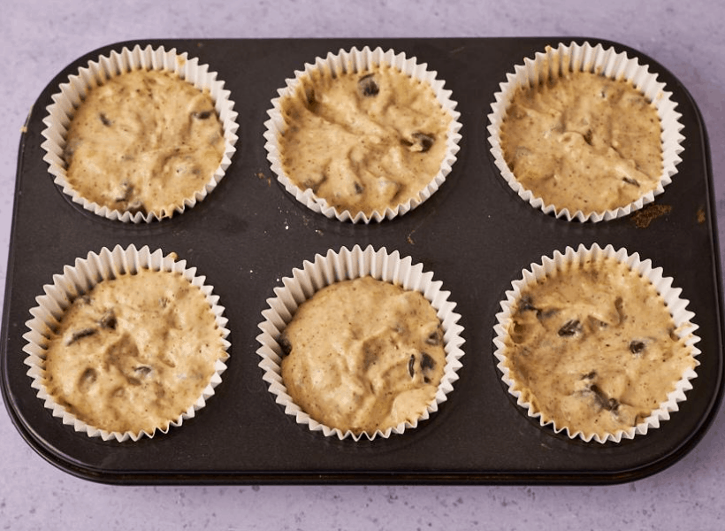 muffin tins filled for baking