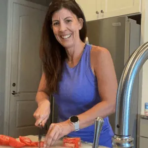 stephanie chopping tomatoes