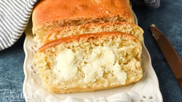 fresh baked amish sourdough bread sliced with butter melting