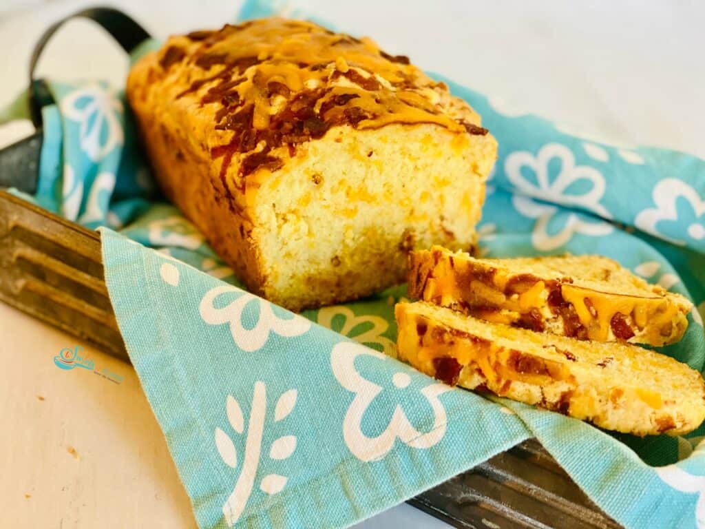 no yeast bacon bread sliced in a basket