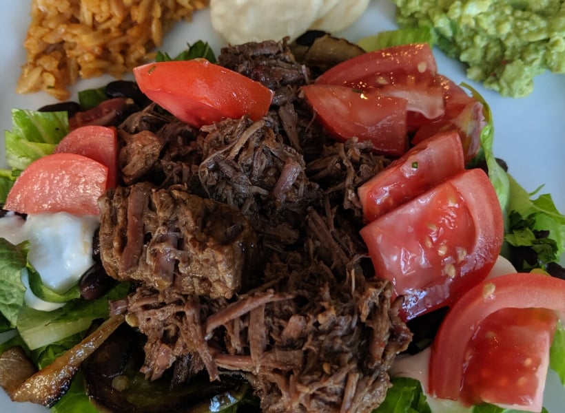 beef barbacoa on salad