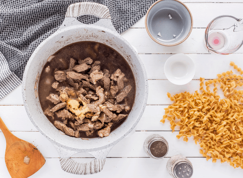 steak with other ingredients in dutch oven 