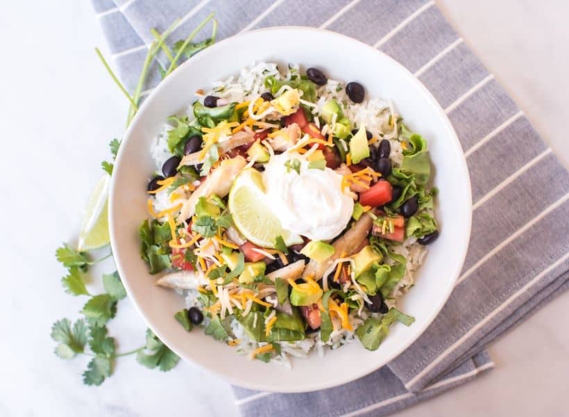 chicken burrito bowl with rice and veggies