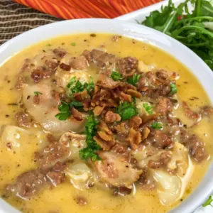 keto cheeseburger soup in a bowl with chopped parsley on top