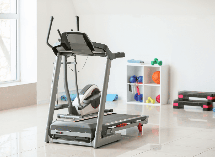 treadmill and other equipment in a home gym