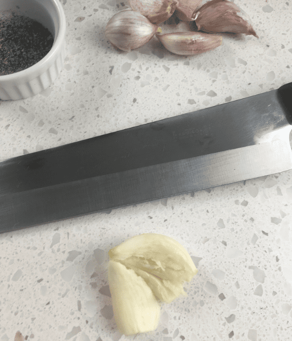 Crushed fresh garlic on counter