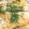 pan seared grouper with garnishment and pepper
