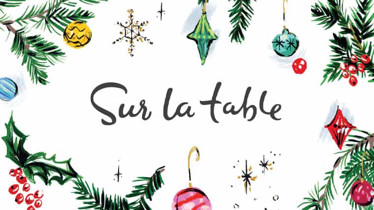sur la table gift card with holiday ornaments printed on it