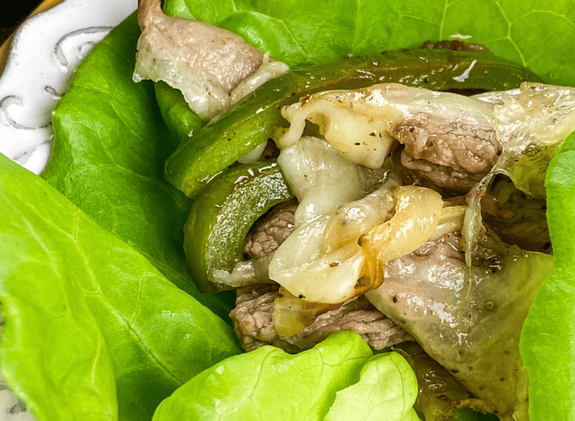 cheesesteak lettuce wrap with peppers and cheese