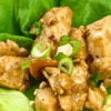 chicken lettuce wraps with peanut sauce on butter lettuce