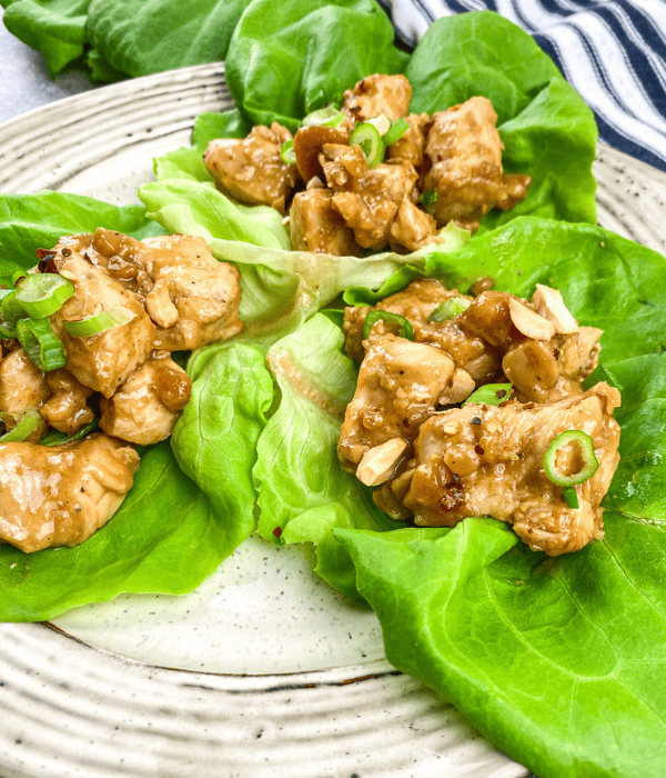 3 chicken lettuce wraps on a plate
