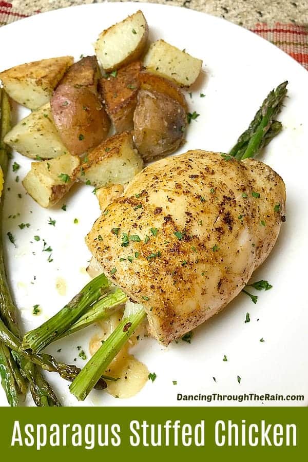 asparagus stuffed chicken with cheese on plate