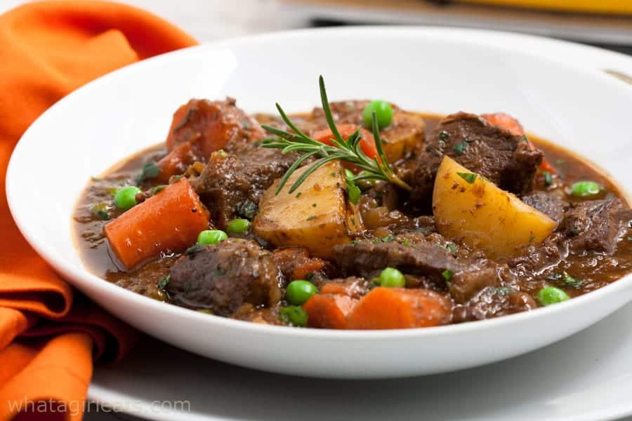 bowl of beef stew with carrots and potatoes