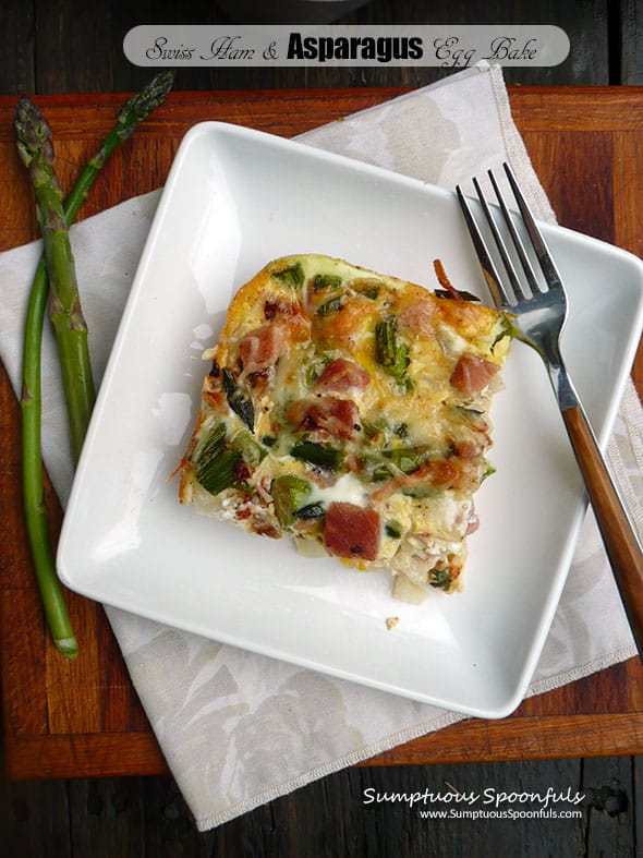 swiss ham and asparagus egg bake on a white plate