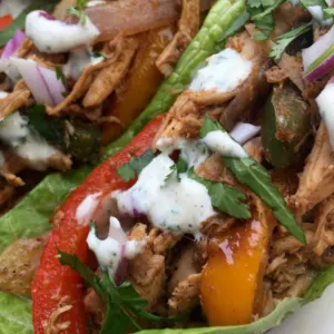 chicken fajitas lettuce wraps on a plate