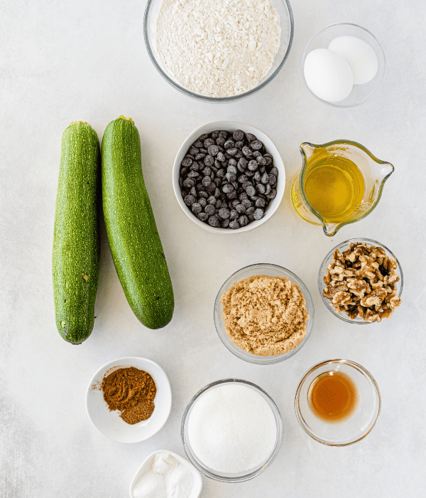 ingredients for zucchini bread in bowls