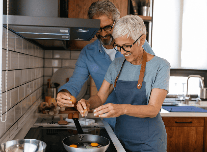 couple cooking healthy nutrition in kitchen