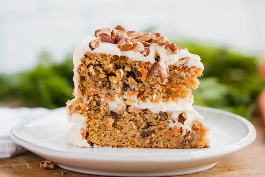 low carb carrot cake with almond flour on white saucer