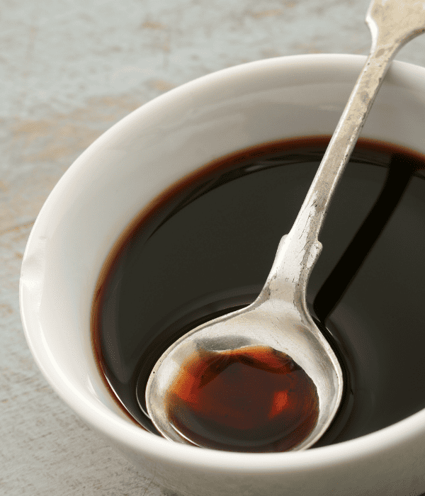 bowl of balsamic vinegar with spoon