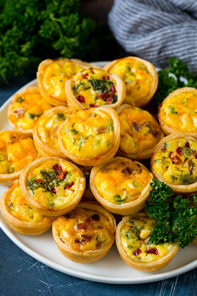 various ingredients mini quiche on a plate