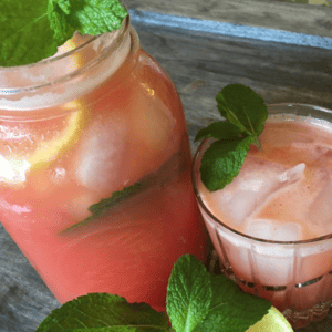 mason jar and small clear glass with watermelon mint lemonade