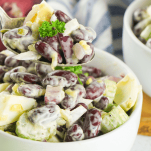 bowls of kidney bean salad with fork