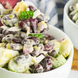 bowls of kidney bean salad with fork