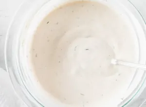 white bowl of buttermilk dressing