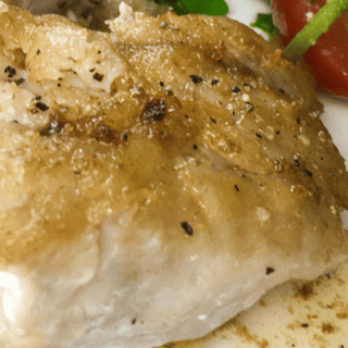 piece of crispy fried grouper on plate