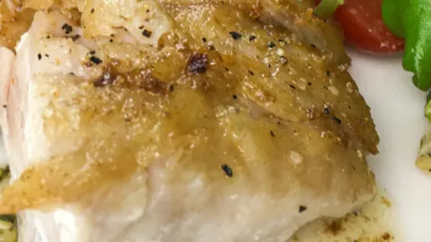 piece of crispy fried grouper on plate