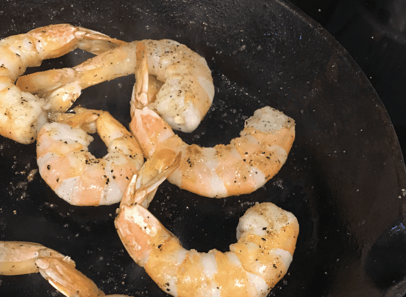 shrimp pan fried in a cast iron skillet