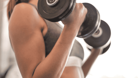 woman doing bicep curls