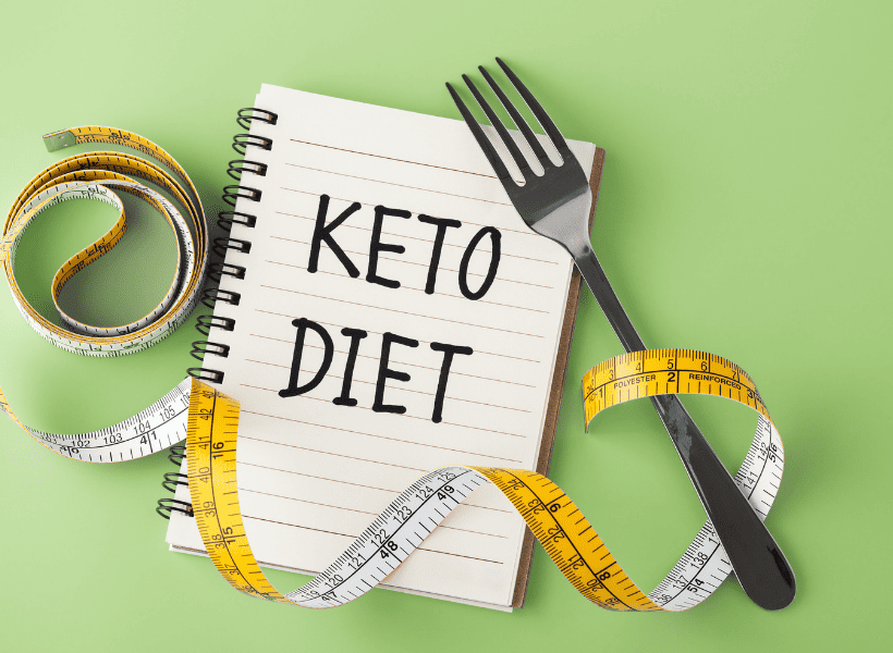 keto notebook, fork and measuring tape