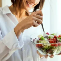 woman eating a salad
