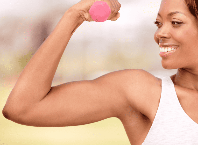 exercises for underarm fat with lady holding dumbbell